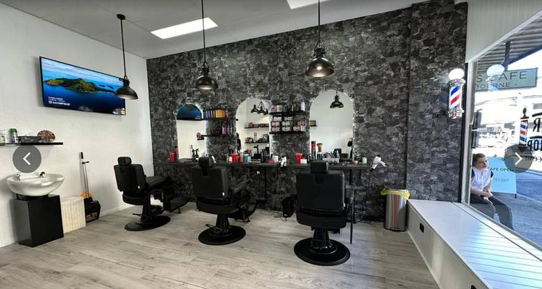 Big Boy Barber three barber chairs and mirrors