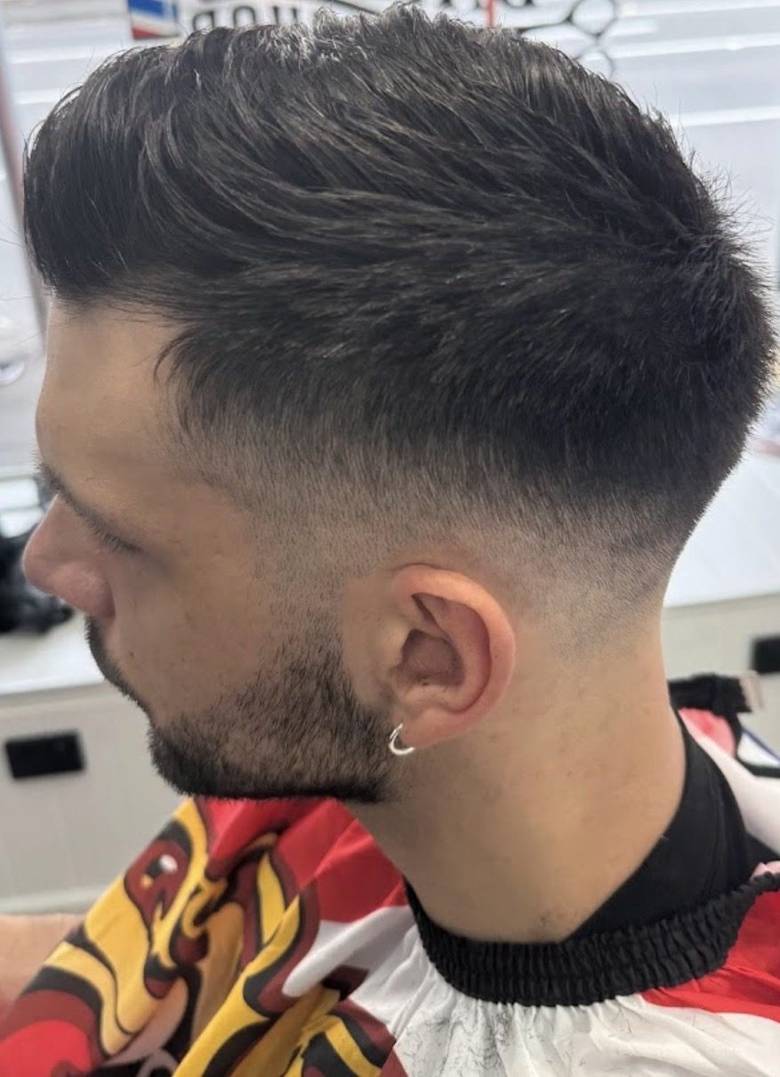 Low fade with textured top, side profile